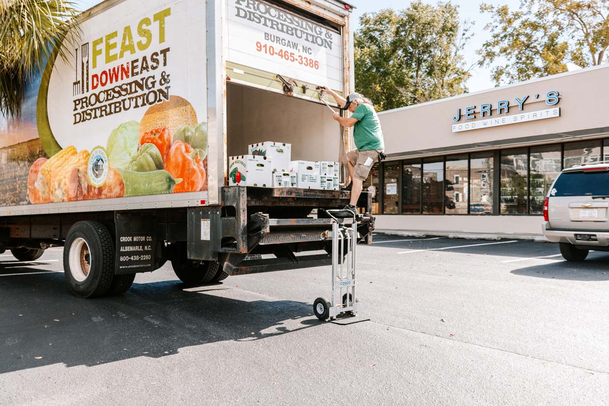 feast down east delivery truck unloading at jerrys wrightsville beach