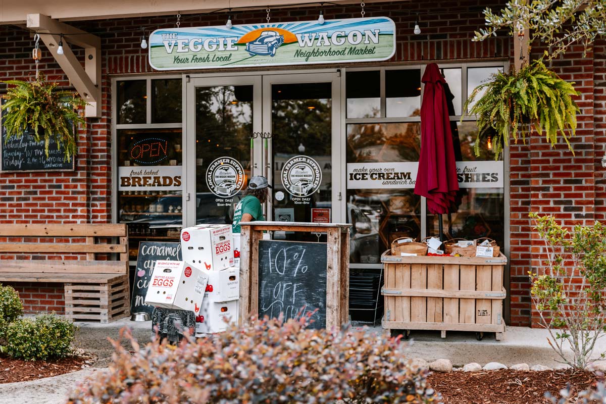 Feast Down East delivering eggs and other local produce to Veggie Wagon on Carolina Beach, NC.