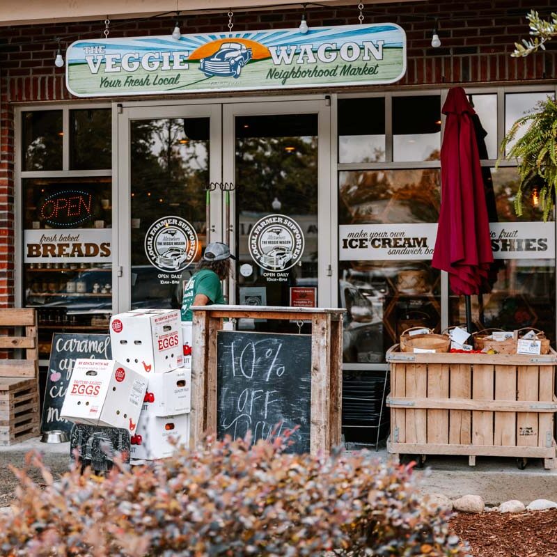 Feast Down East delivering eggs and other local produce to Veggie Wagon on Carolina Beach, NC.